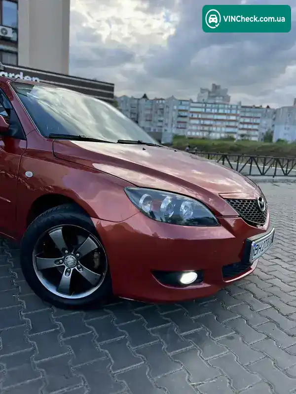 Mazda 3 2004, фото з оголошення 2 з 21, VIN JMZBK14Z551153293