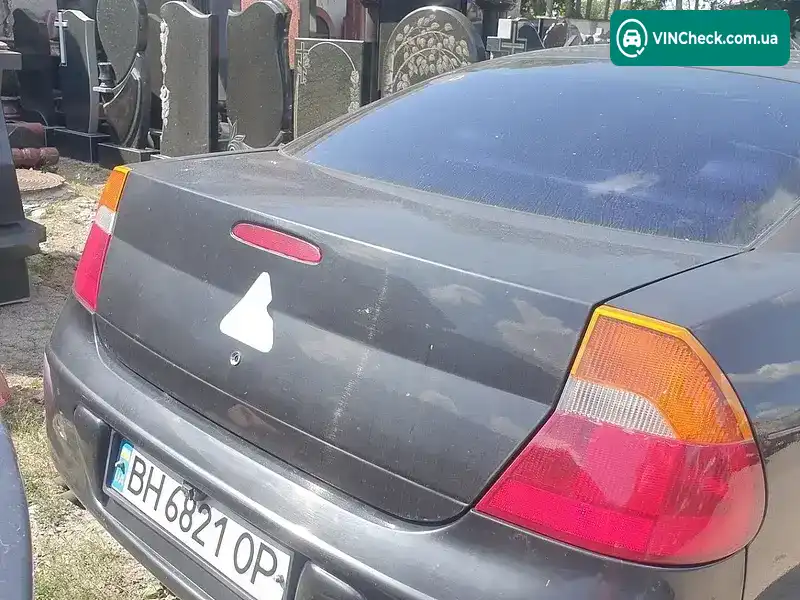 Chrysler 300M 1999, фото з оголошення 1 з 2, VIN 1C3HEB6G2XH765795