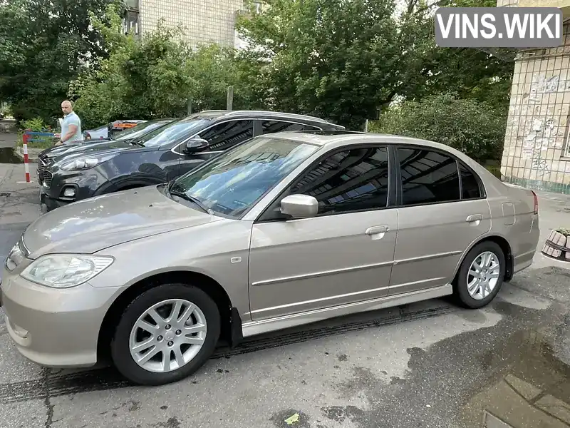 Honda Civic 2004, фото з оголошення 2 з 17, VIN NLAES76704W320040
