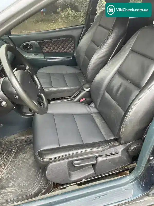 Mazda 323 1995, фото з оголошення 2 з 13, VIN JMZBA145201172475