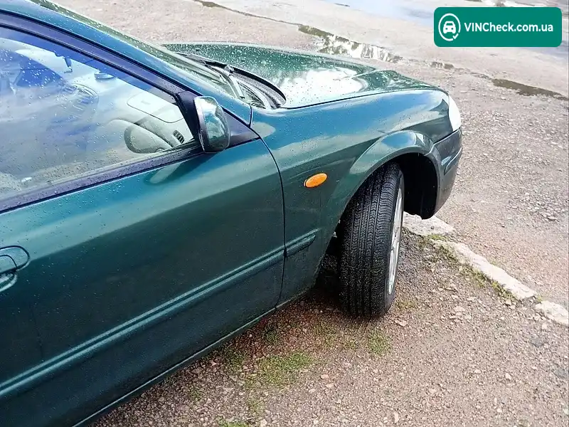 Mazda 323 1999, фото з оголошення 1 з 7, VIN JMZBJ14R201234007