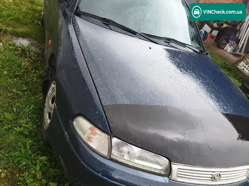 Mazda 626 1997, фото з оголошення 1 з 10, VIN JMZGC143201658236