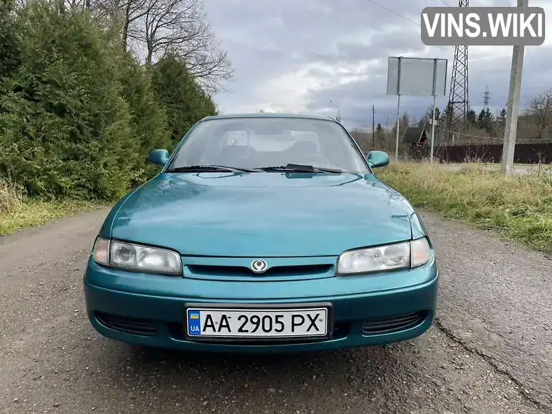 Mazda 626 1996, фото з оголошення 2 з 21, VIN JMZGE12J201482061