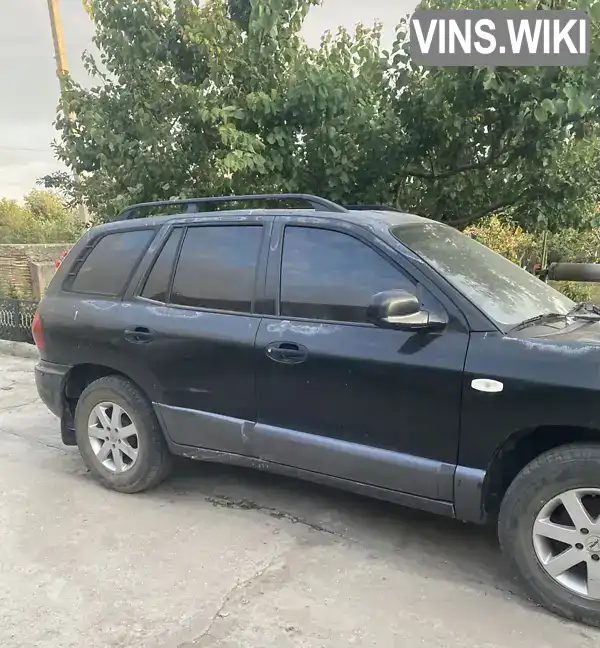 Hyundai Santa FE 2003, фото з оголошення 2 з 5, VIN KMHSC81VP3U397887