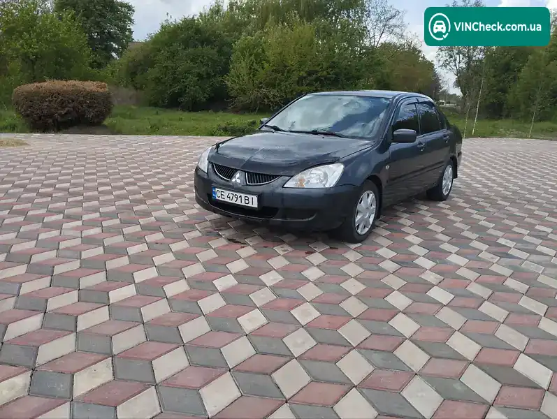 Mitsubishi Lancer 2003, фото з оголошення 1 з 17, VIN JMBSNCS3A4U004265