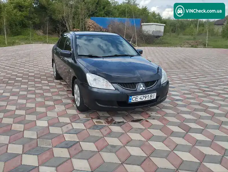 Mitsubishi Lancer 2003, фото з оголошення 2 з 17, VIN JMBSNCS3A4U004265
