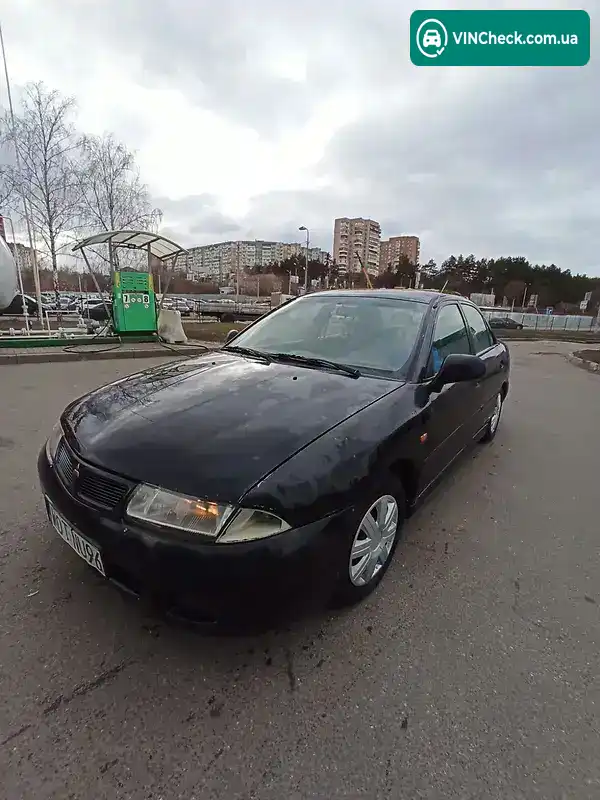 Mitsubishi Carisma 1999, фото з оголошення 1 з 9, VIN XMCSNDA2AWF023394