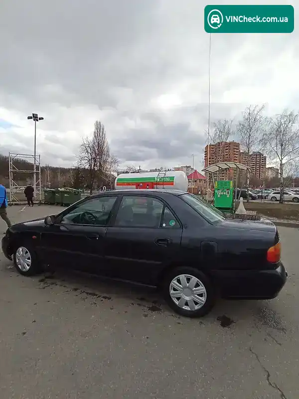 Mitsubishi Carisma 1999, фото з оголошення 2 з 9, VIN XMCSNDA2AWF023394