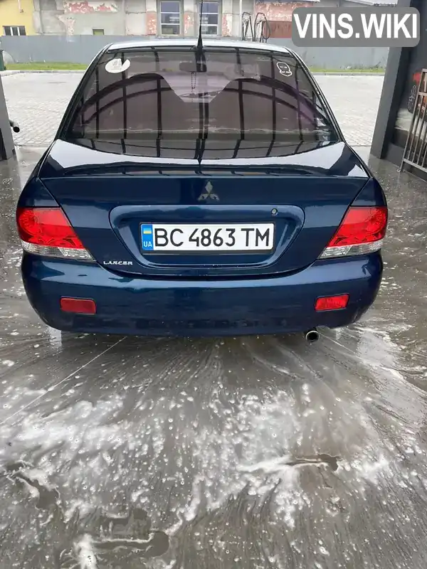 Mitsubishi Lancer 2004, фото з оголошення 2 з 21, VIN JMBSNCS3A4U011995