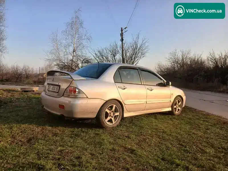 Mitsubishi Lancer 2004, фото з оголошення 2 з 15, VIN JMBSNCS9A5U000700