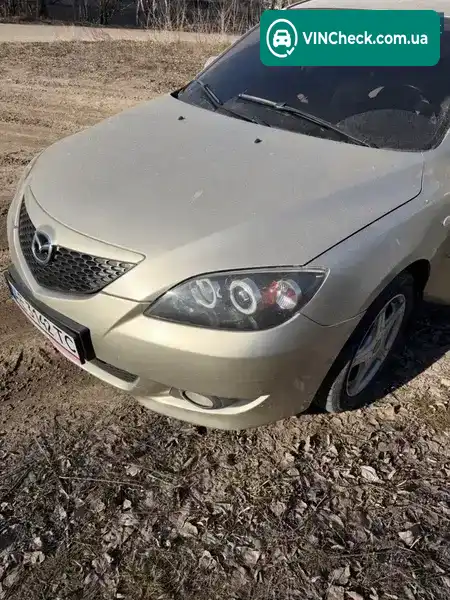 Mazda 3 2004, фото з оголошення 2 з 21, VIN JMZBK14Z551172635