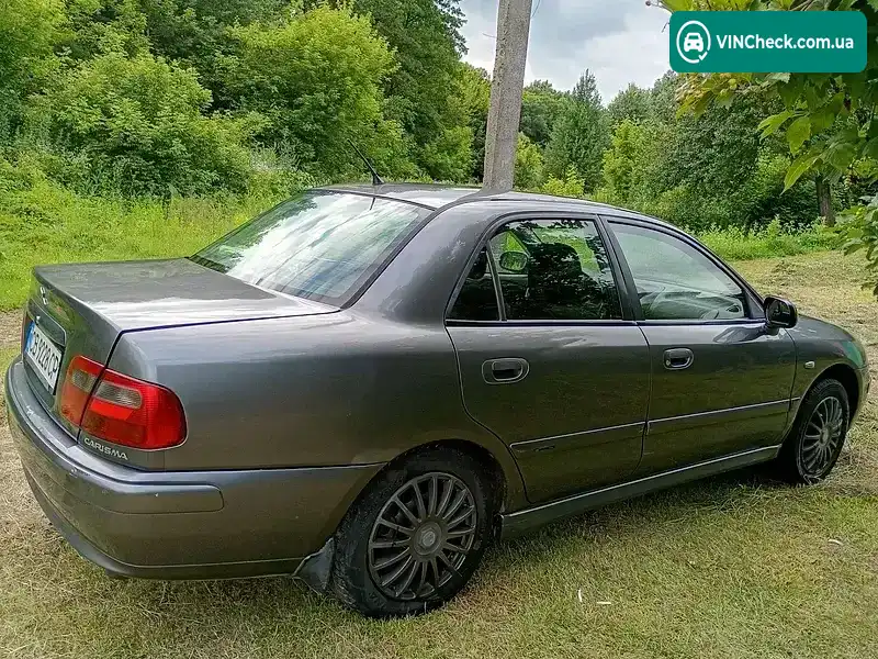 Mitsubishi Carisma 2003, фото з оголошення 2 з 6, VIN XMCSNDA1A3F040893