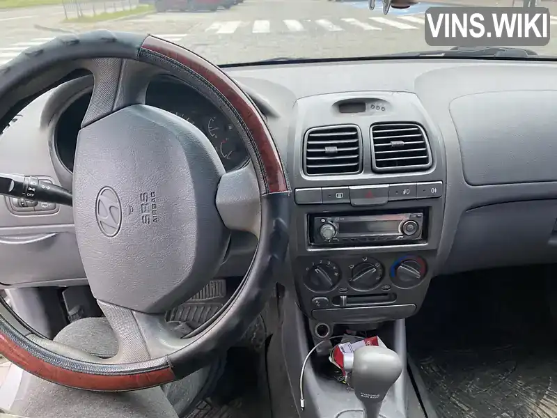 Hyundai Accent 2000, фото з оголошення 2 з 8, VIN KMHCH51FPYU055623