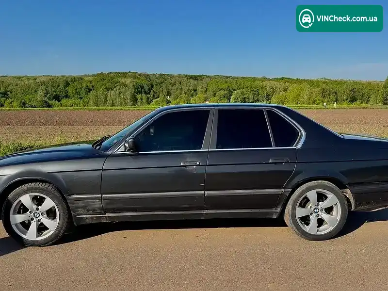 BMW 7 Series 1993, фото з оголошення 2 з 12, VIN WBAGA710103652351