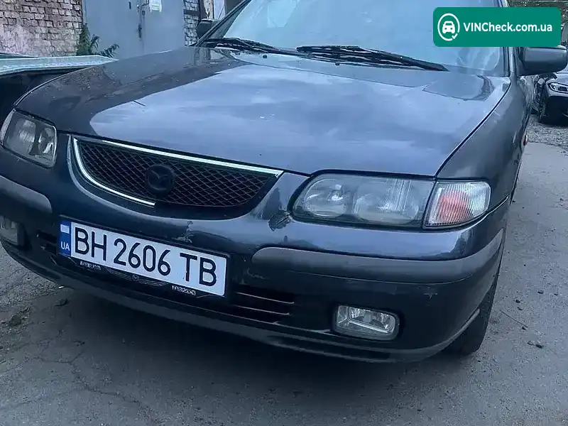 Mazda 626 1998, фото з оголошення 1 з 3, VIN JM7GF12S9X1111951