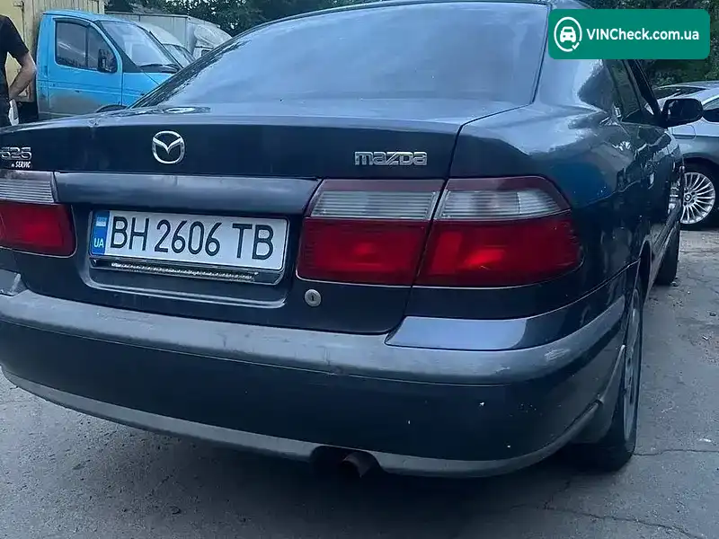 Mazda 626 1998, фото з оголошення 2 з 3, VIN JM7GF12S9X1111951