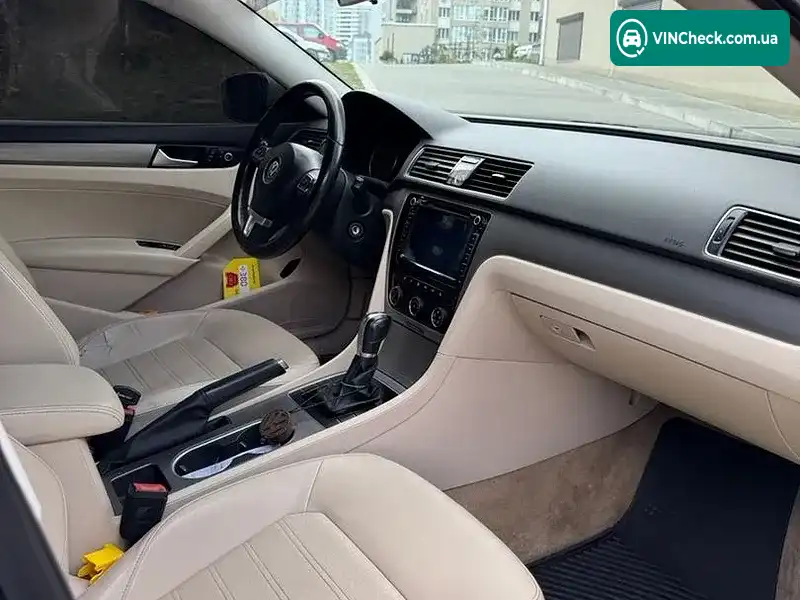 Volkswagen Passat 2014, фото з оголошення 2 з 11, VIN 1VWAS7A32FC015474