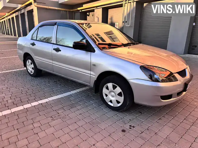 Mitsubishi Lancer 2004, фото з оголошення 2 з 16, VIN JMYSRCS1A4U783882
