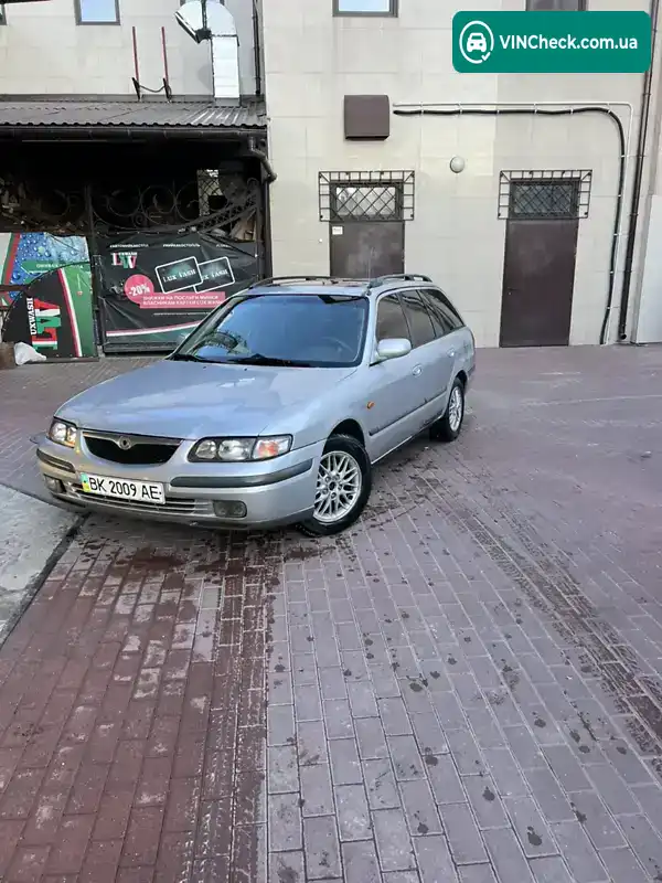 Mazda 626 1998, фото з оголошення 1 з 7, VIN JMZGW19S201104059