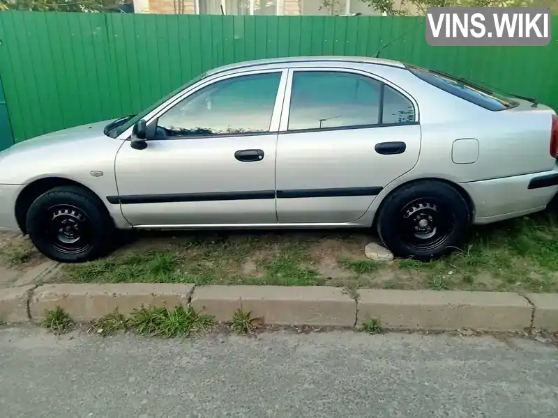 Mitsubishi Carisma 2000, фото з оголошення 2 з 13, VIN XMCLNDA1AYF023607