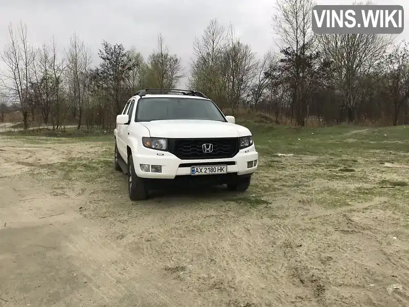 Honda Ridgeline 2014, фото з оголошення 2 з 6, VIN 5FPYK1F69EB007625