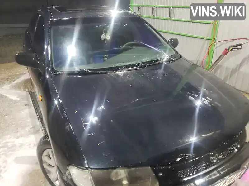 Mazda 323 1995, фото з оголошення 1 з 8, VIN JMZBA125200169246