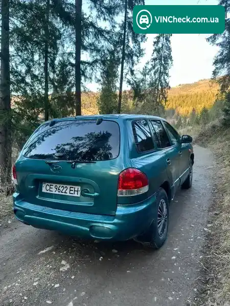 Hyundai Santa FE 2001, фото з оголошення 2 з 15, VIN KMHSC81BP1U030565