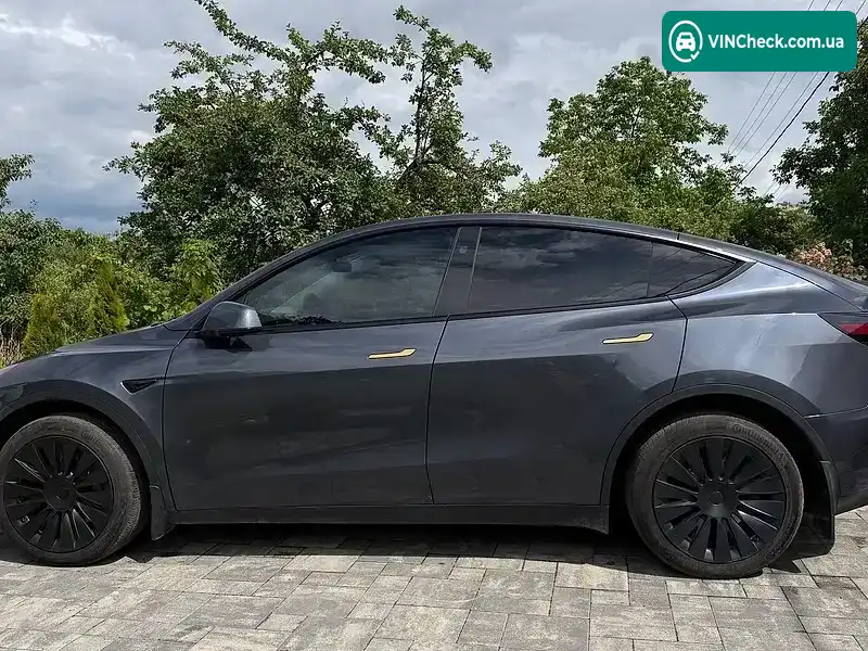 Tesla Model Y 2023, фото з оголошення 2 з 14, VIN 7SAYGDEE4PF905477