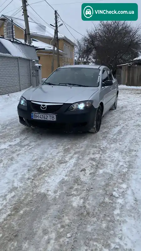 Mazda 3 2004, фото з оголошення 1 з 8, VIN JM7BK326451105539