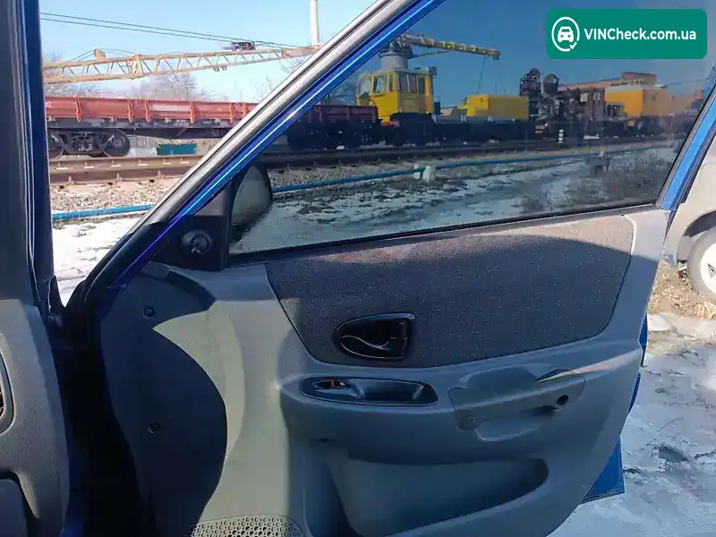 Hyundai Accent 2001, фото з оголошення 2 з 18, VIN KMHCG51FP1U112059
