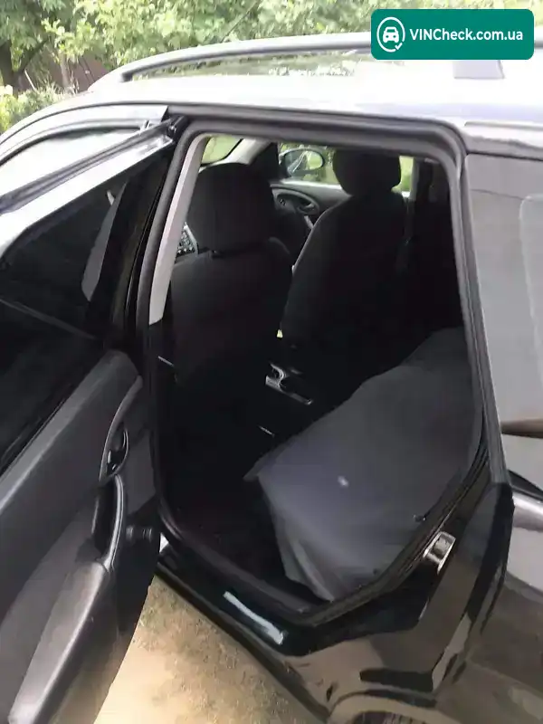 Ford Focus 2004, фото з оголошення 2 з 9, VIN WF0NXXGCDN4G19939