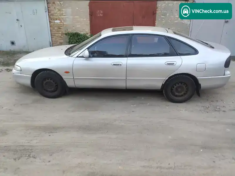 Mazda 626 1996, фото з оголошення 1 з 14, VIN JMZGE14J201447903