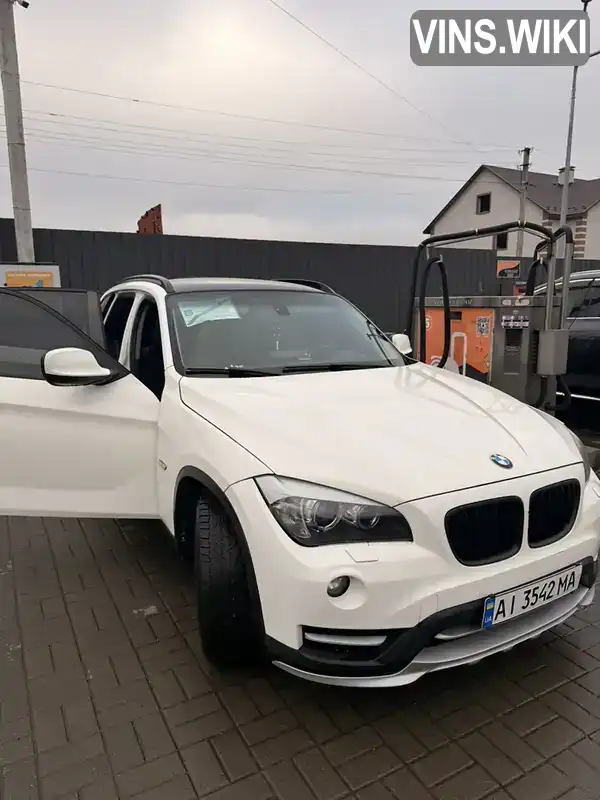 BMW X1 2012, фото з оголошення 2 з 21, VIN WBAVP11000VU15258