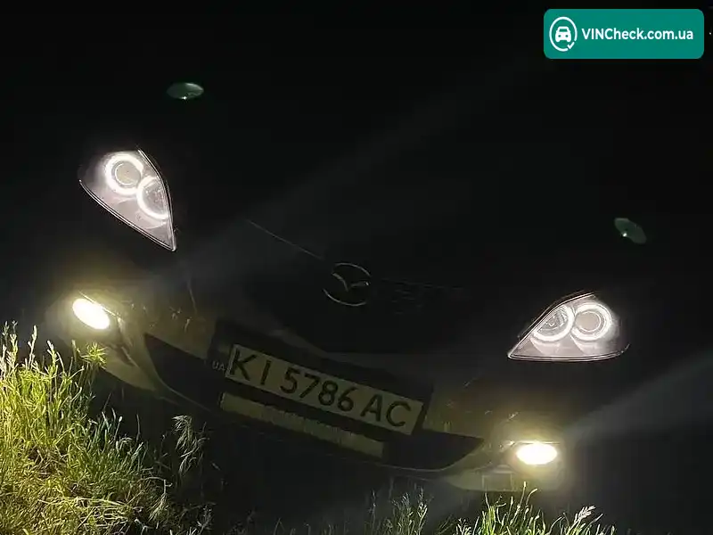 Mazda 3 2003, фото з оголошення 2 з 9, VIN JMZBK14Z241101469