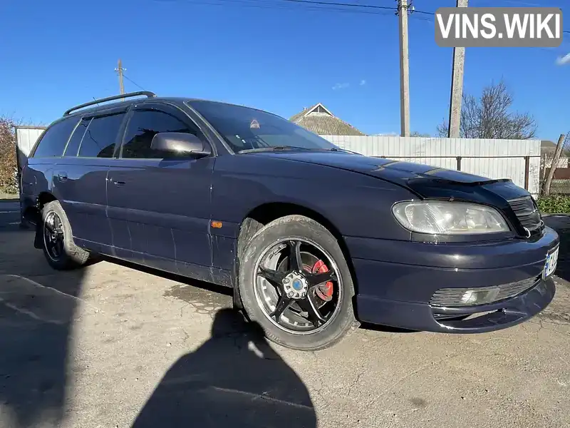 Opel Omega 2000, фото з оголошення 2 з 11, VIN W0L0VBF35Y1121439