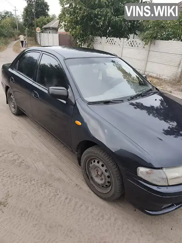 Mazda 323 1998, фото з оголошення 2 з 11, VIN JMZBA125200599933