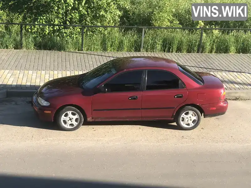 Mazda 323 1996, фото з оголошення 2 з 11, VIN JM1BB1439T0343438