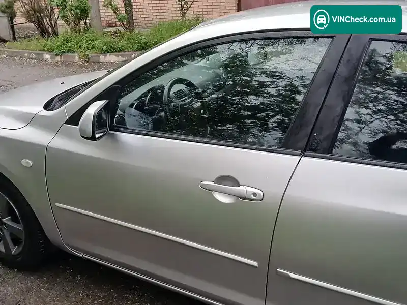 Mazda 3 2004, фото з оголошення 2 з 21, VIN JMZBK14Z241120790