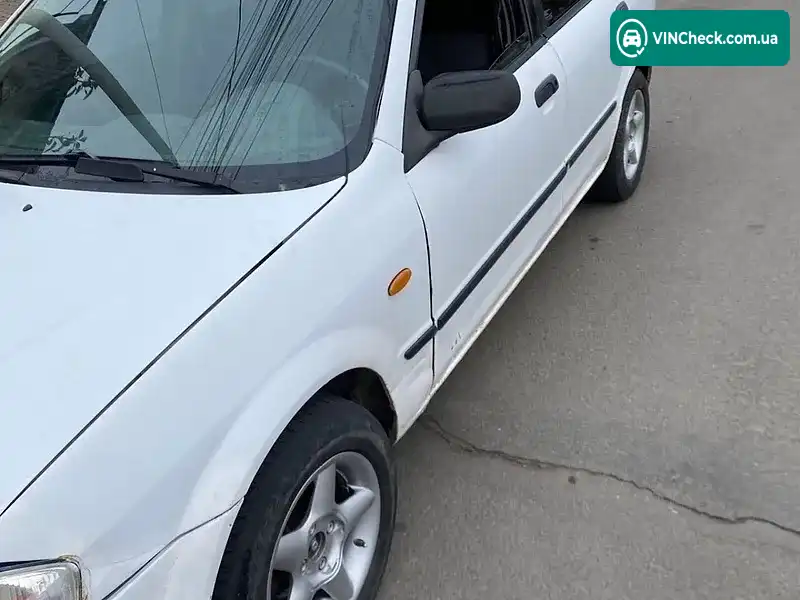 Mazda 323 1999, фото з оголошення 1 з 11, VIN JMZBJ12L200220314