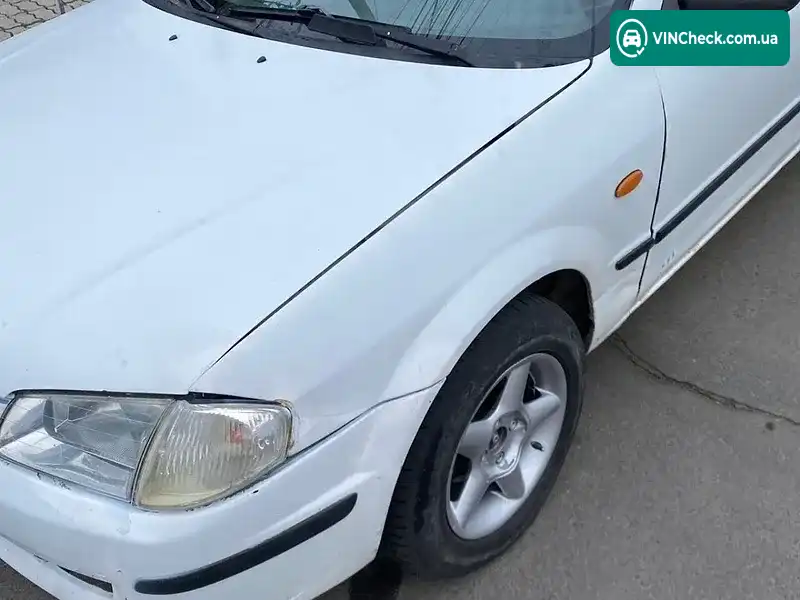 Mazda 323 1999, фото з оголошення 2 з 11, VIN JMZBJ12L200220314