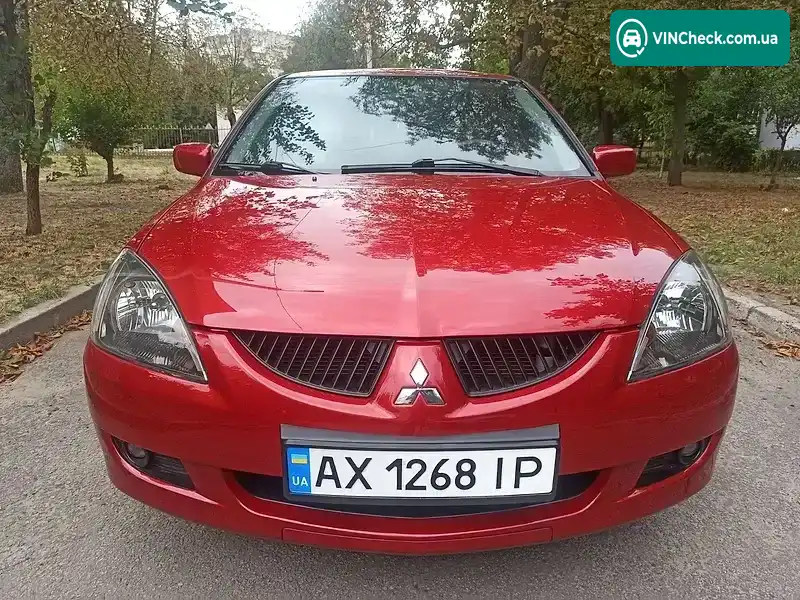 Mitsubishi Lancer 2003, фото з оголошення 2 з 15, VIN JMBSRCS3A4U002965