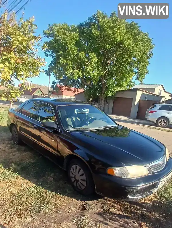 Mazda 626 1999, фото з оголошення 1 з 5, VIN 1YVGF22C1X5826802