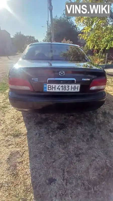 Mazda 626 1999, фото з оголошення 2 з 5, VIN 1YVGF22C1X5826802