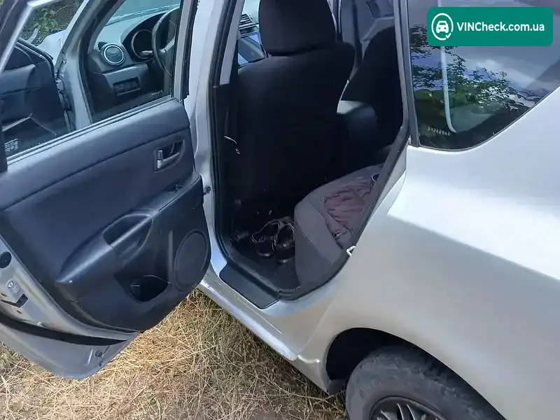 Mazda 3 2004, фото з оголошення 2 з 9, VIN JMZBK143251242940
