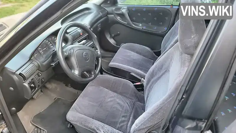 Opel Astra 1994, фото з оголошення 2 з 18, VIN W0L000035C2700007