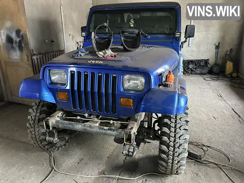 Jeep Wrangler 1994, фото з оголошення 2 з 11, VIN 1J4FY29SXRP422875