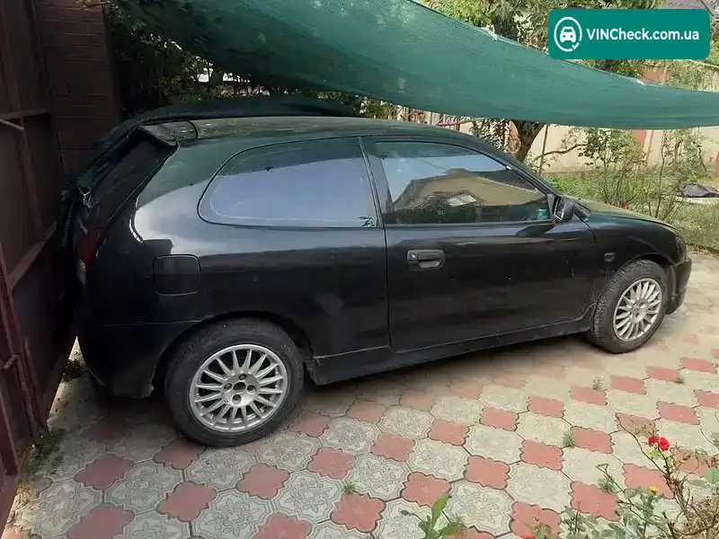 Mitsubishi Colt 1999, фото з оголошення 2 з 7, VIN JMBMNCJ1AWU025257