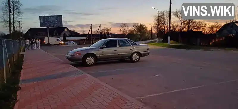 Ford Taurus 1990, фото з оголошення 2 з 11, VIN 1FACP50UXLA159427