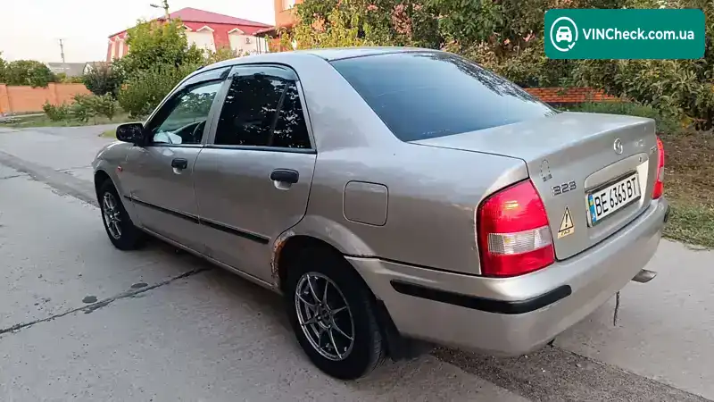 Mazda 323 1999, фото з оголошення 2 з 14, VIN JMZBJ12L200193435