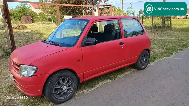 Daihatsu Cuore 2000, фото з оголошення 1 з 11, VIN JDAL701S001026907